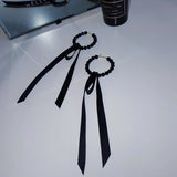 New Women Korean temperament Black crystal earrings contracted long Ribbon Drop earrings geometric circular modelling