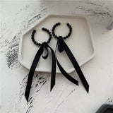 New Women Korean temperament Black crystal earrings contracted long Ribbon Drop earrings geometric circular modelling