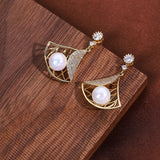 Exquisite inlaid zirconium hollow fan earrings gold electroplating women's prom party earrings Korean jewelry