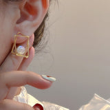 Hollow Out Geometric Earrings With Single Bubble Pearl Elements Creative New Fashion Jewelry Wholesale